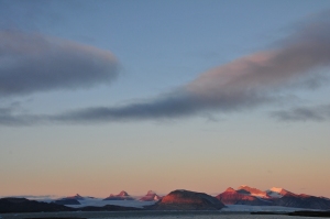The sun begins to go down over Svalbard as the summer draws to a close.